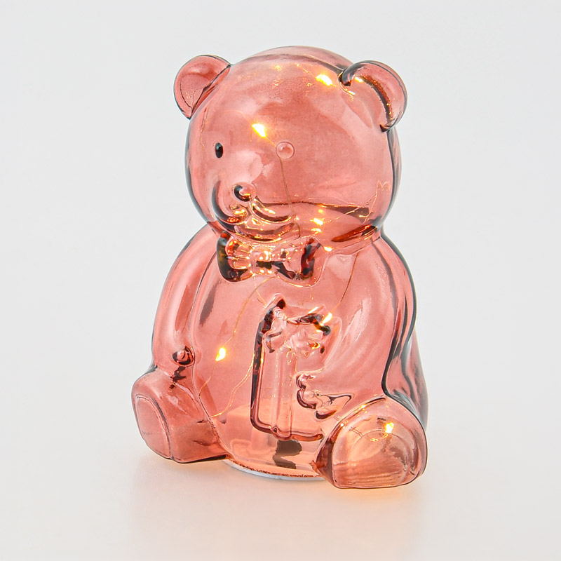 Ourson en verre lumineux à poser rose