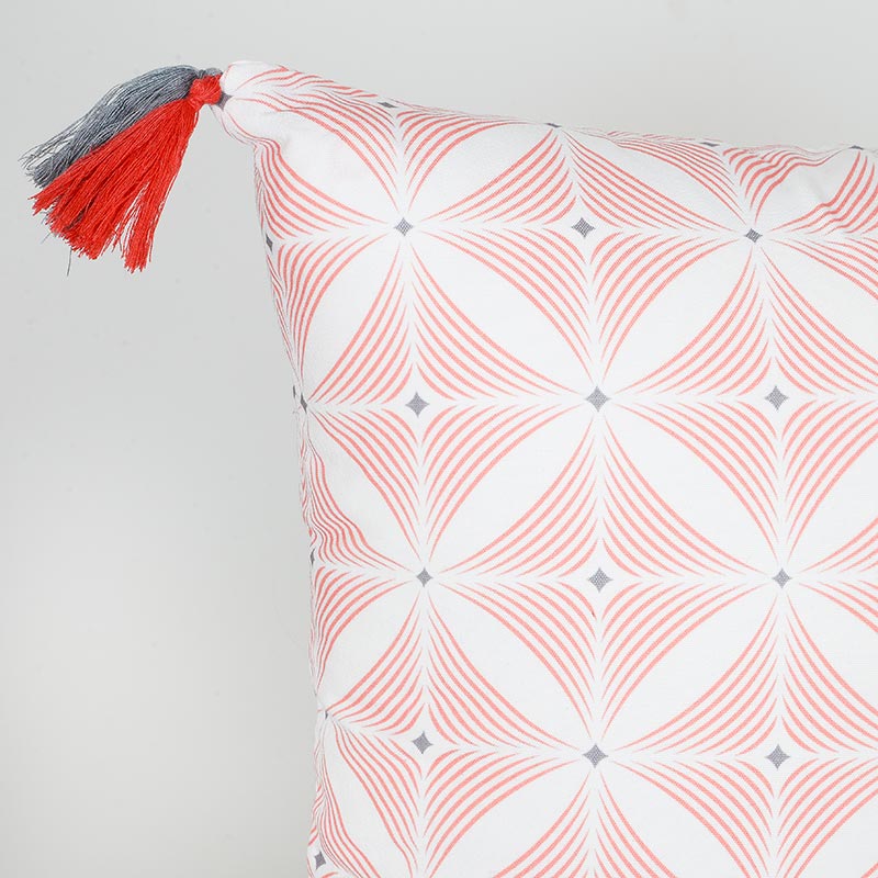 Coussin imprimé avec pompons 'Switch'