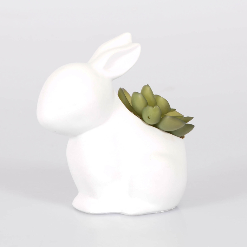 Lapin porte plante 