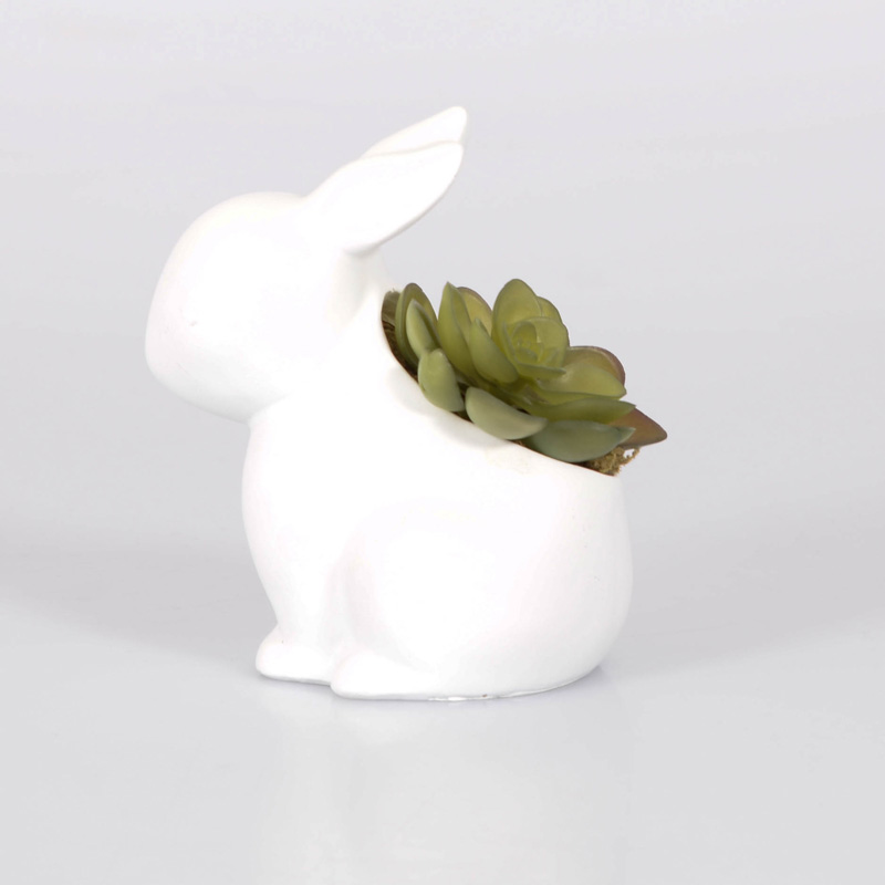 Lapin porte plante 