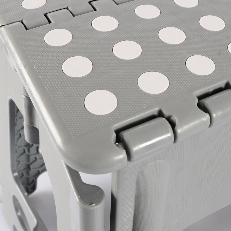 Marche pied pliable