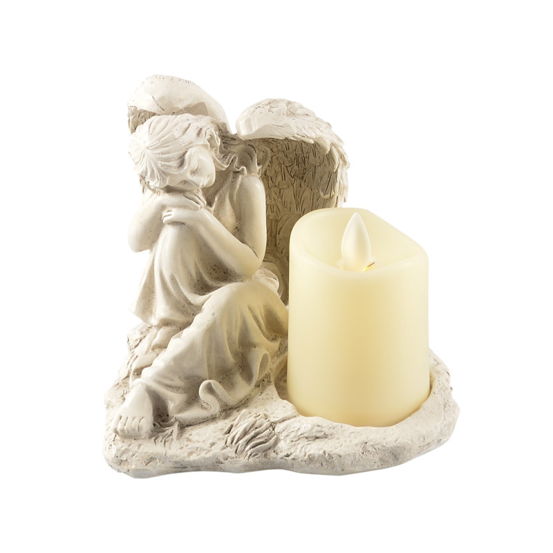 Sainte Vierge assise avec bougie