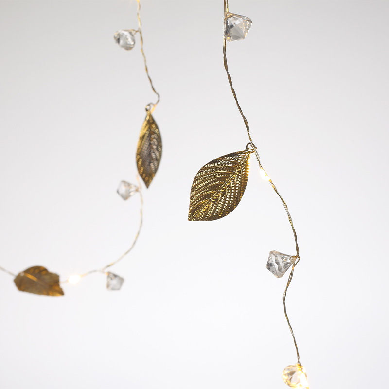 Guirlande lumineuse feuilles et perles or - L'Incroyable