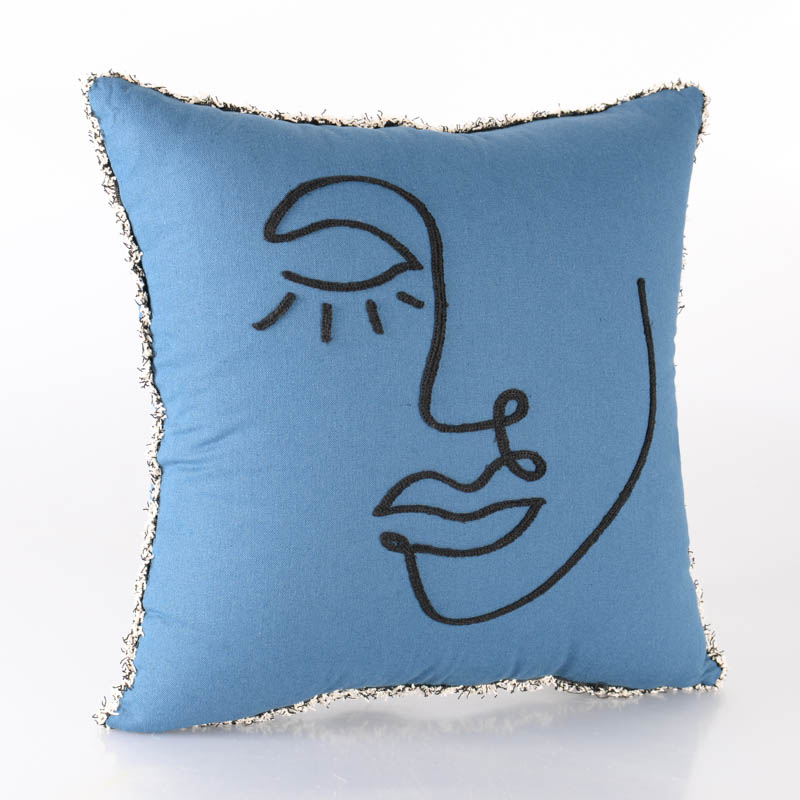 Coussin brodé visage 'Faciès'