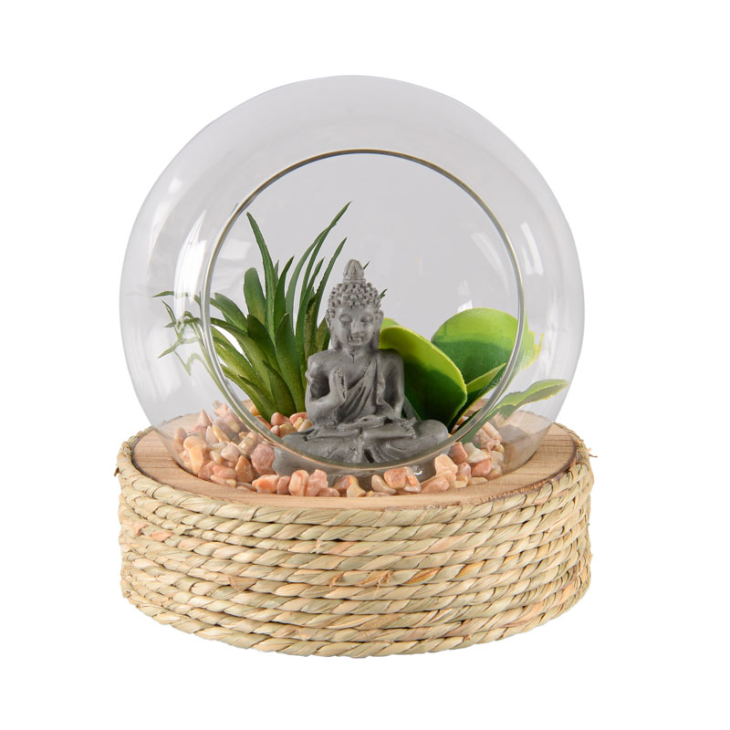 Boule en verre avec bouddha