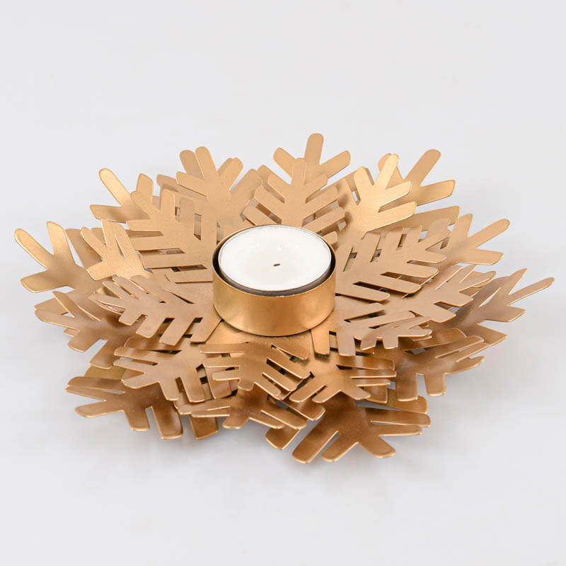 Bougeoir en forme de flocon doré