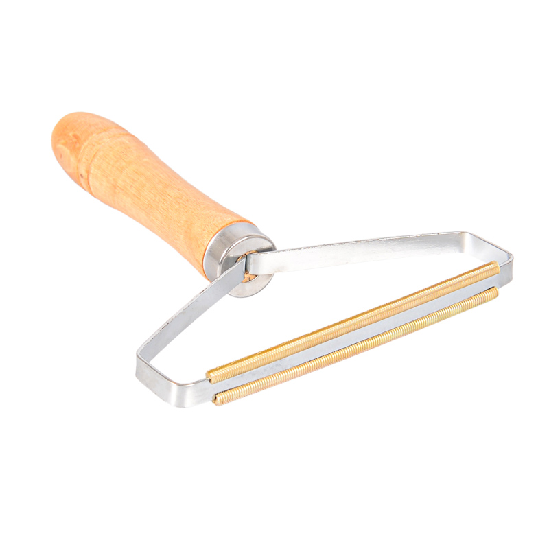 Brosse manuelle anti peluches et anti poils