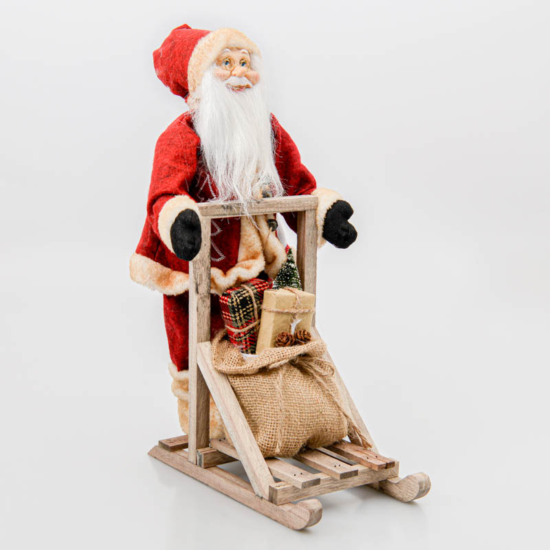 Figurine Père Noël sur traineau