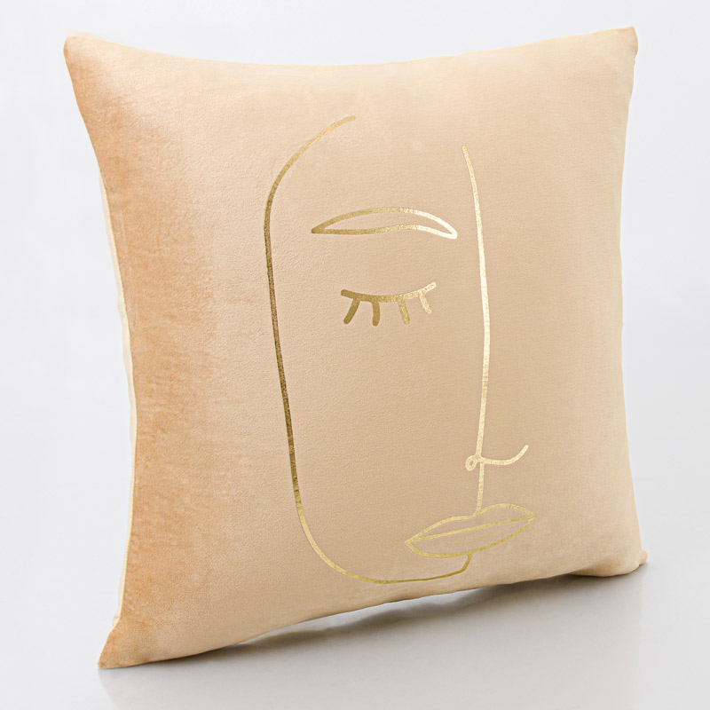 Coussin visage 'Faciès' camel et or