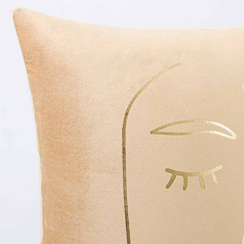 Coussin visage 'Faciès' camel et or