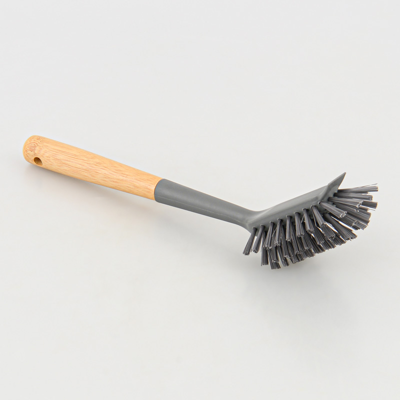 Brosse avec manche grise
