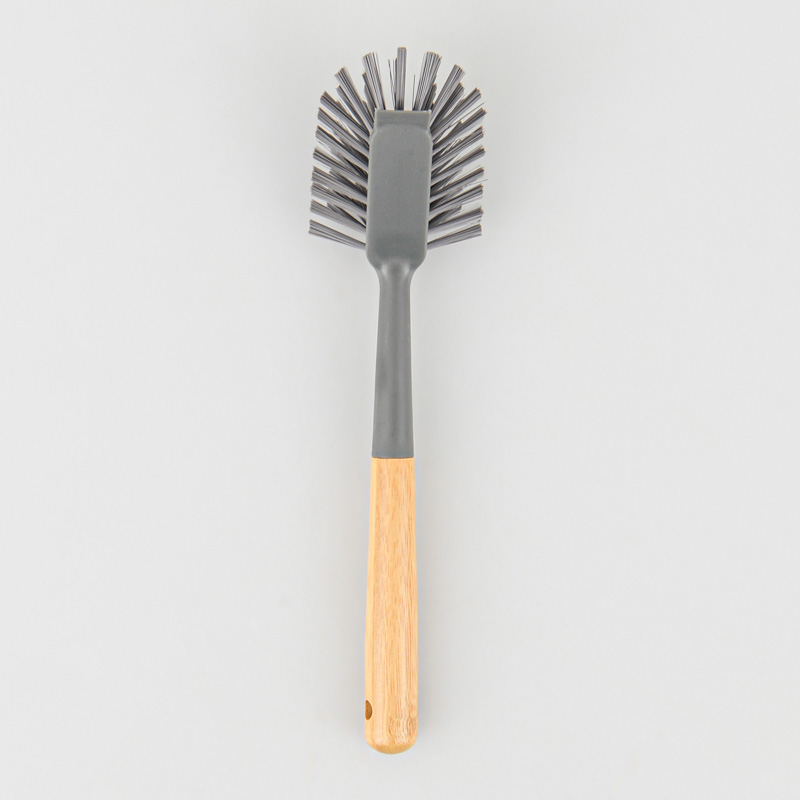 Brosse avec manche grise
