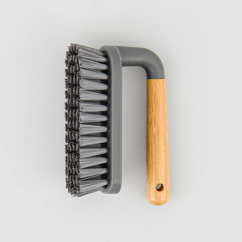 Brosse avec poignée grise