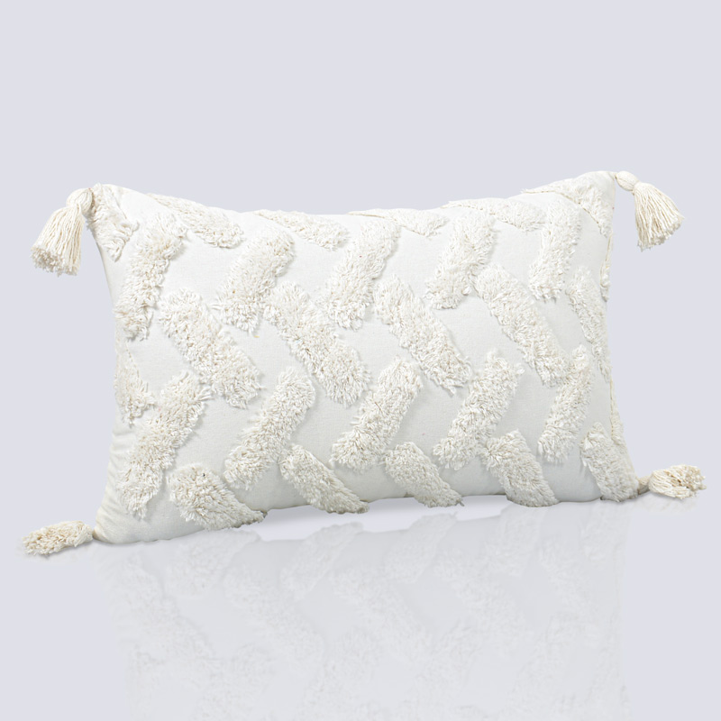 Coussin 'Hindi' coton tufté et pompons écru
