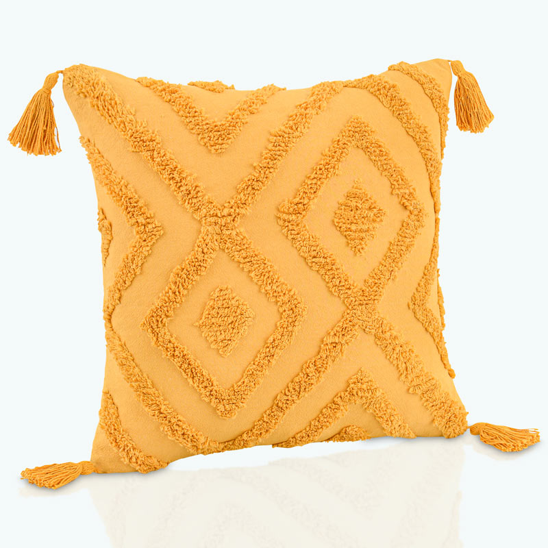 Coussin 'Elias' avec pompons jaune safran