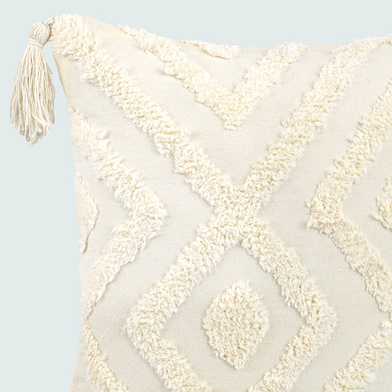 Coussin 'Elias' avec pompons écru