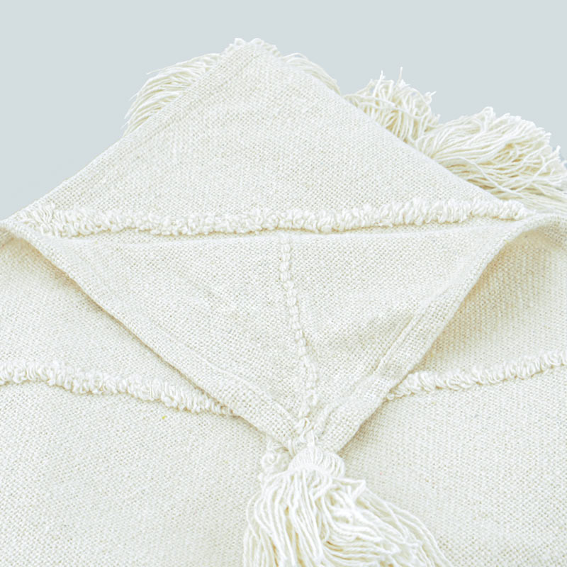 Plaid en coton 'Sofia' tufté avec pompons