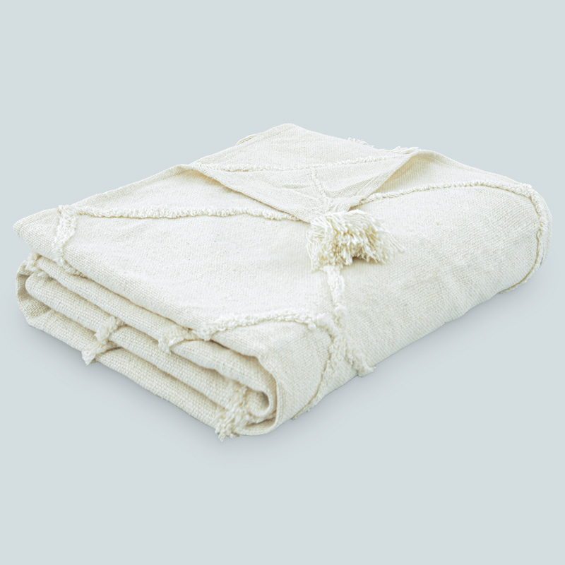 Plaid en coton 'Sofia' tufté avec pompons