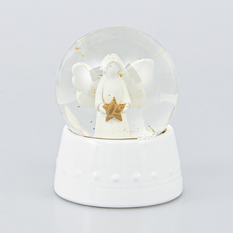 Boule à eau pailletée avec ange