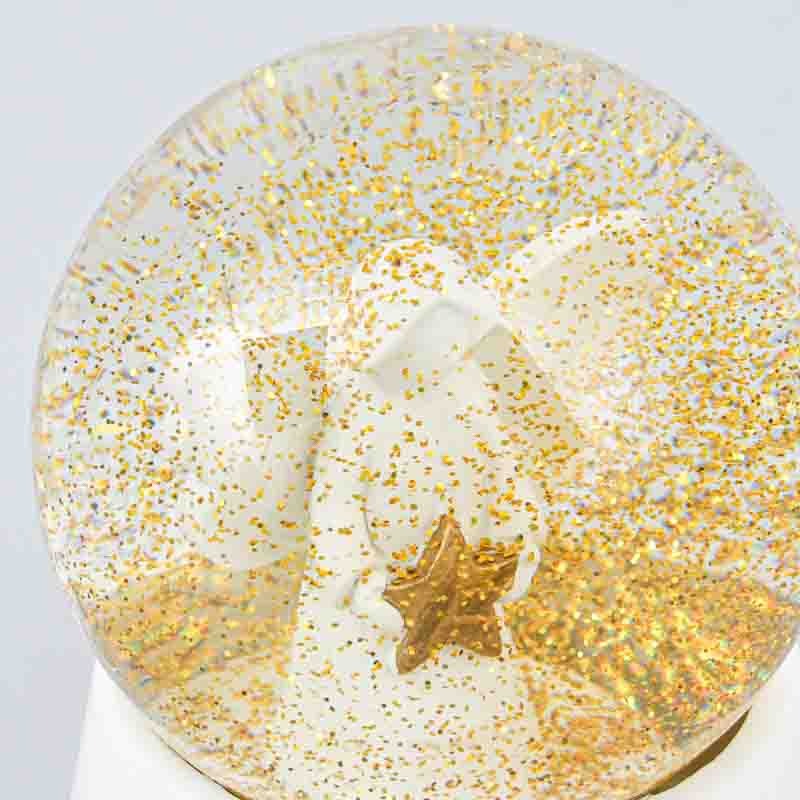 Boule à eau pailletée avec ange