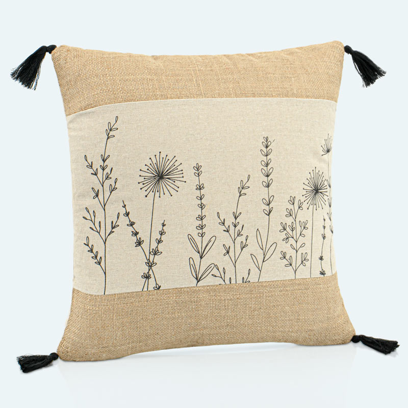 Coussin 'Ticia' imprimé floral et pompons 