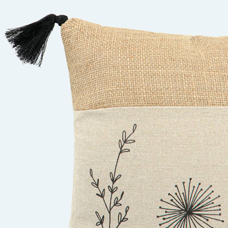 Coussin 'Ticia' imprimé floral et pompons 