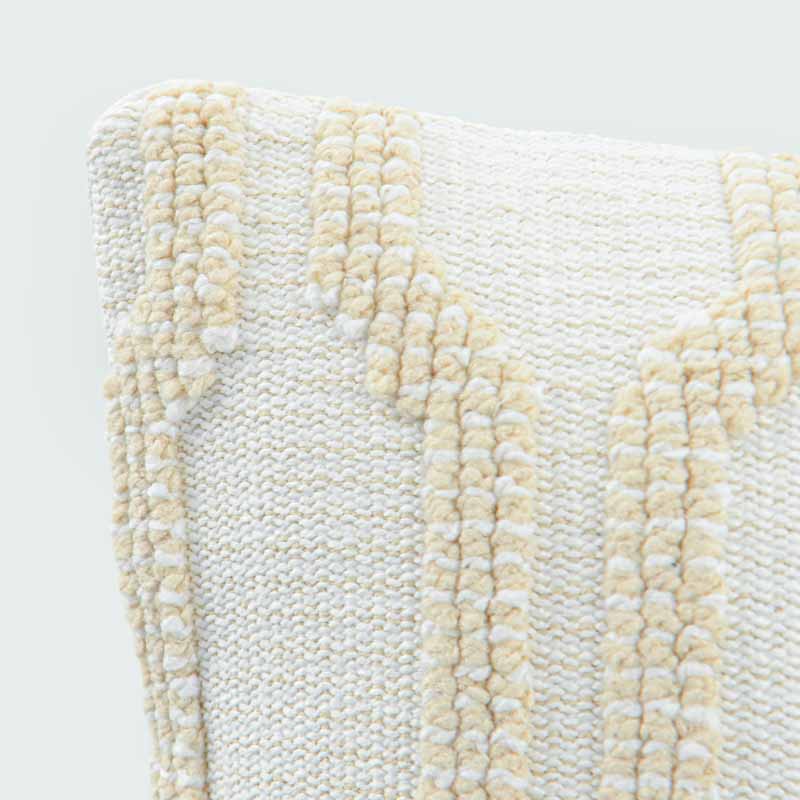 Coussin 'Maki' tufté beige