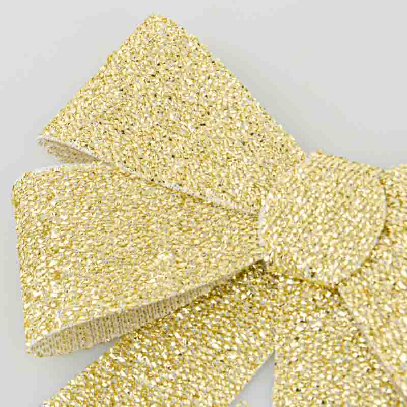 Nœud brillant doré