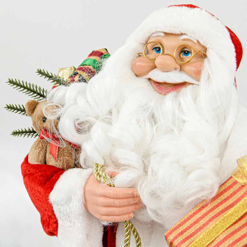 Père Noël automate avec cadeaux et ours