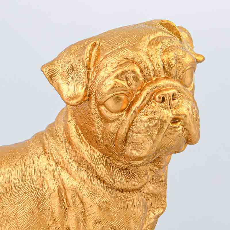 Chien décoratif doré