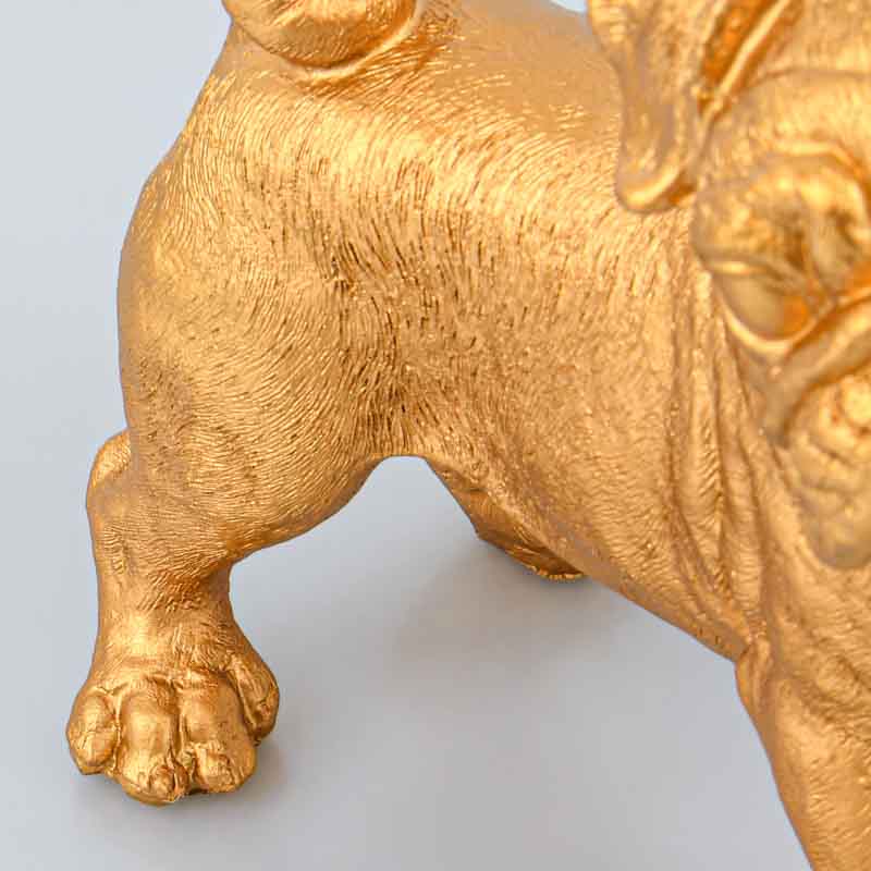 Chien décoratif doré