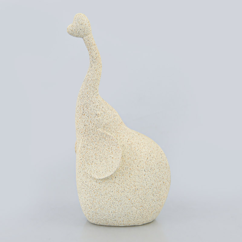 Éléphant décoratif avec trompe coeur crème