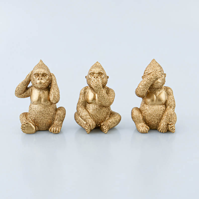 Trio de gorilles doré