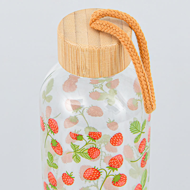 Bouteille motifs fraises en verre 