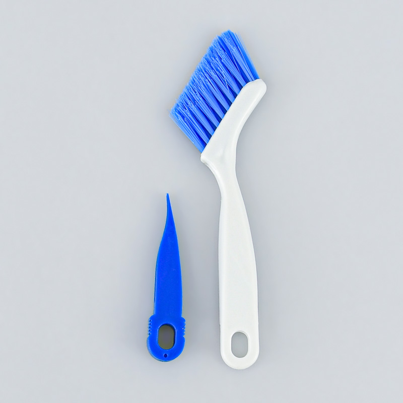 Brosse et grattoir porte coulissante