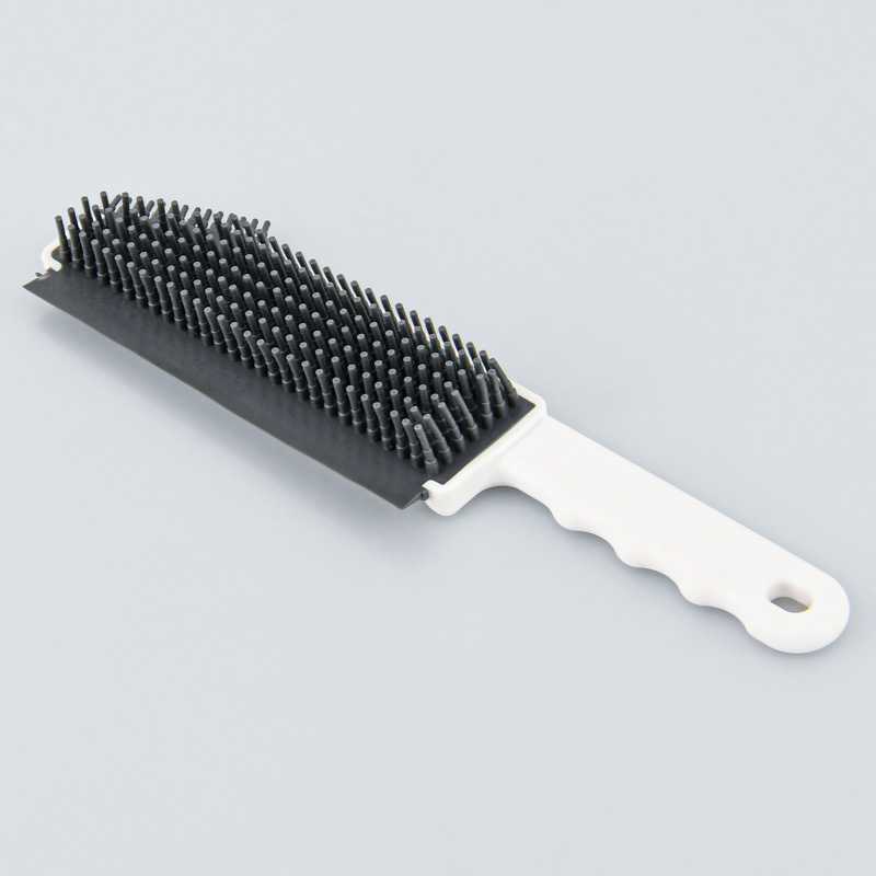 Brosse ramasse poils