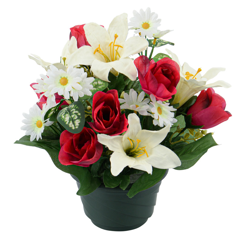 Coupe de roses et lys trompette rouges