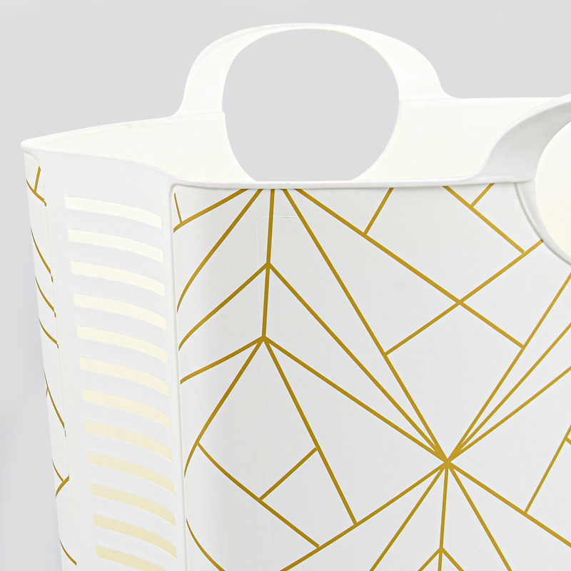 Panier à linge avec lignes dorées