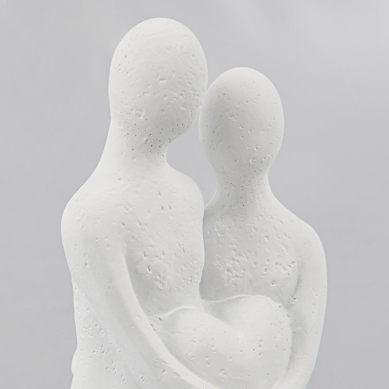 Statue couple coeur blanche