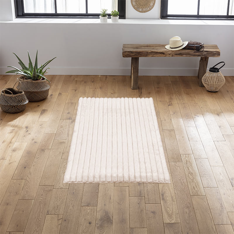 Tapis 'Stripes' imitation fourrure beige
