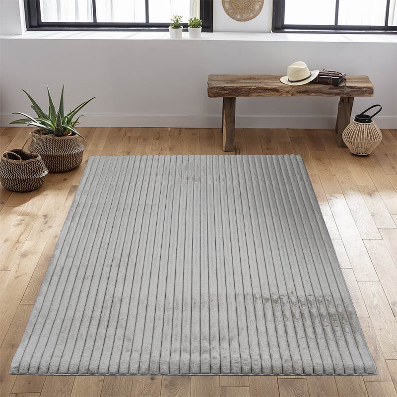 Tapis 'Stripes' imitation fourrure taupe