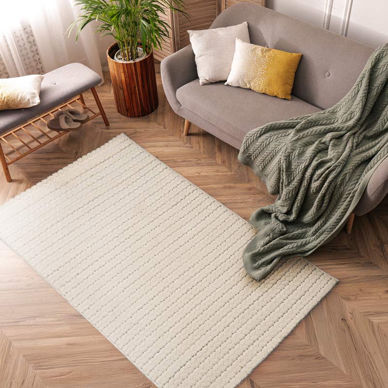 Tapis 'Book' tressés blanc 