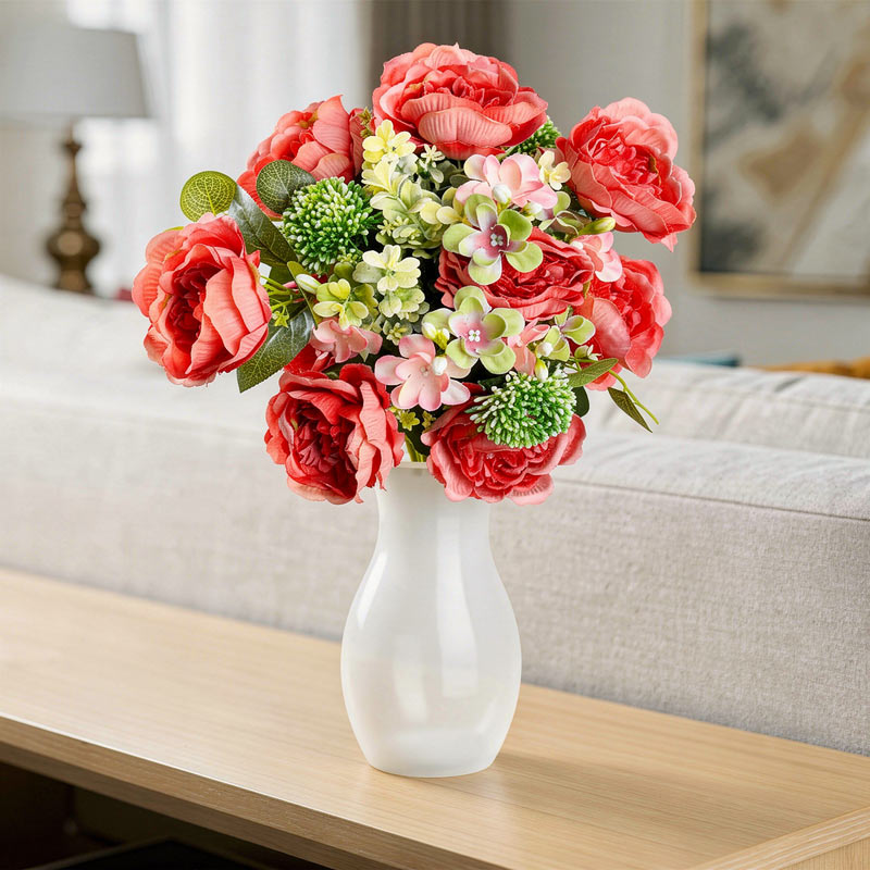 Bouquet haut de pivoines eucalyptus herbacées