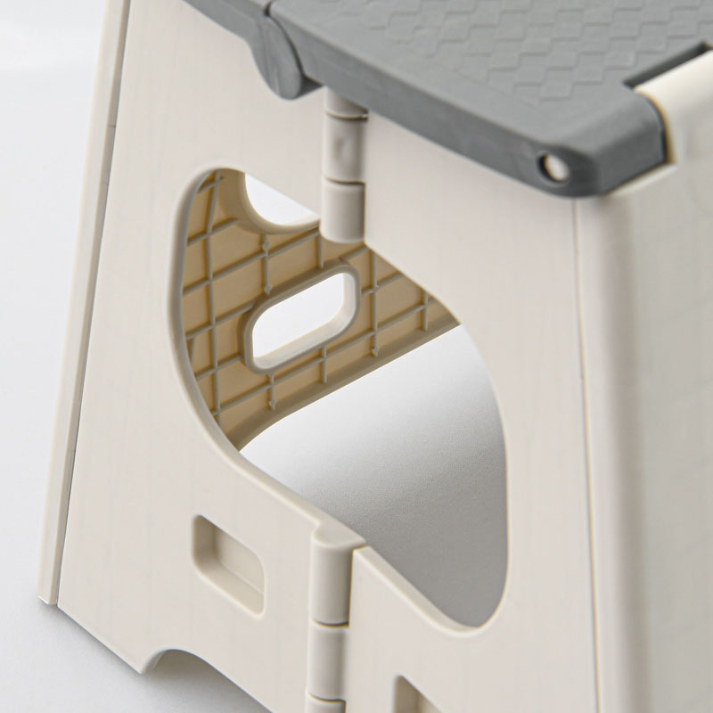 Marche pied pliable gris