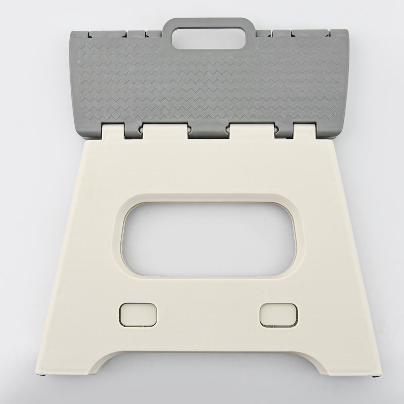 Marche pied pliable gris