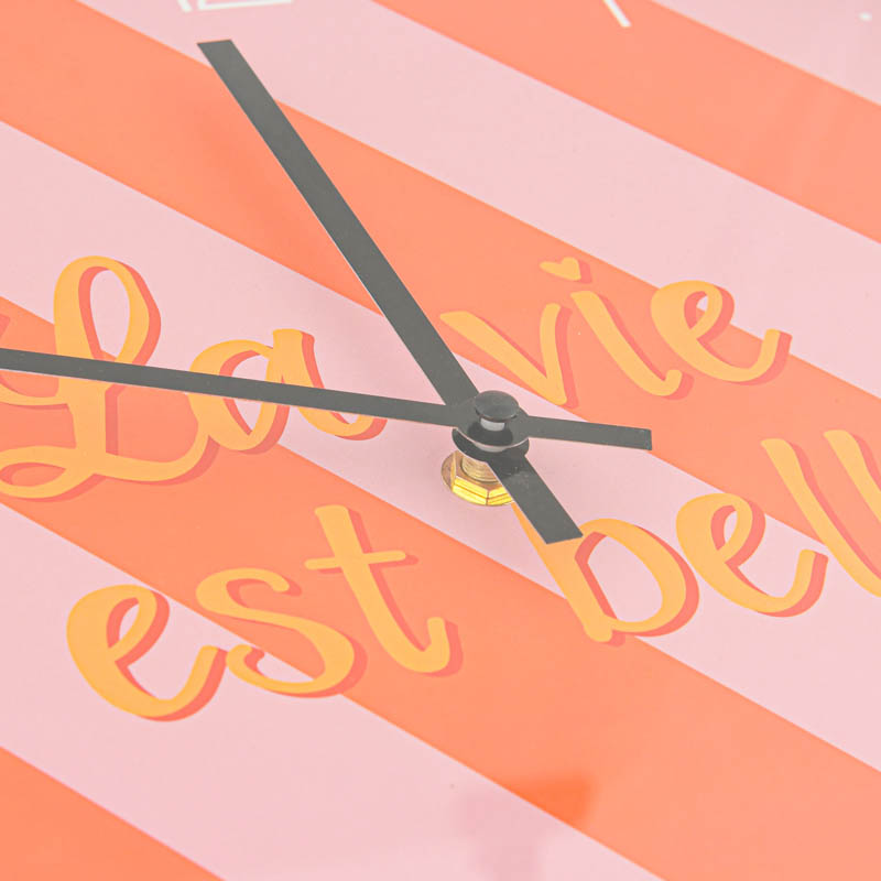 Horloge murale rayée 'Retronova' rose orange 