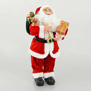 Père Noël automate avec cadeaux et ours